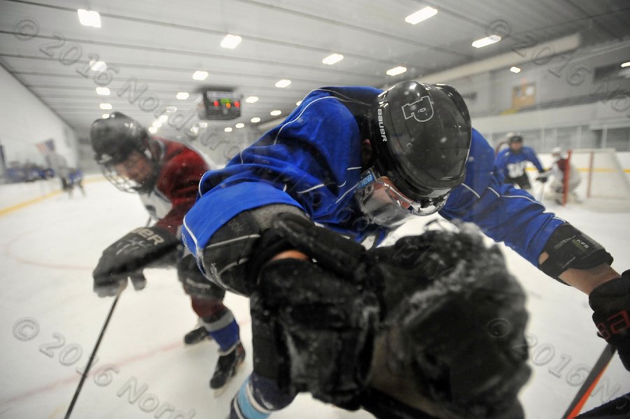 Wheaton College Men\'s Ice Hockey vs Middlesex Community College. - Photo By: KEITH NORDSTROM